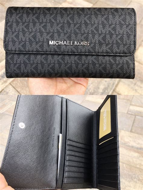 michael kors travel wallet sale|Michael Kors trifold wallet black.